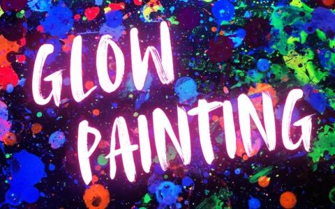 Glow-in-the-dark splatter paint in different colors with neon text that says "glow painting" on top