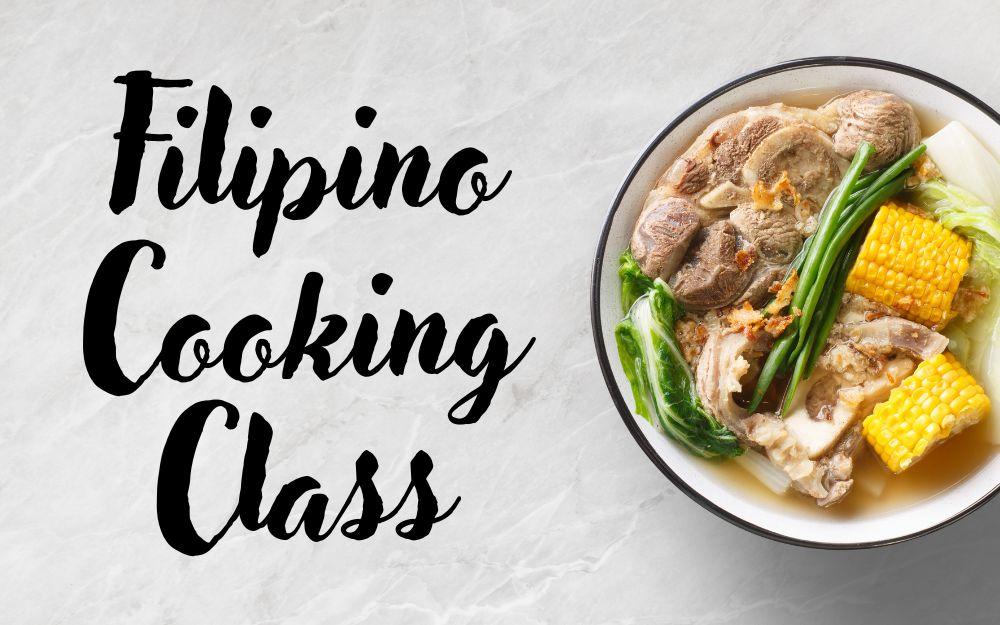 bowl of Beef Sinigang on a marble counter top