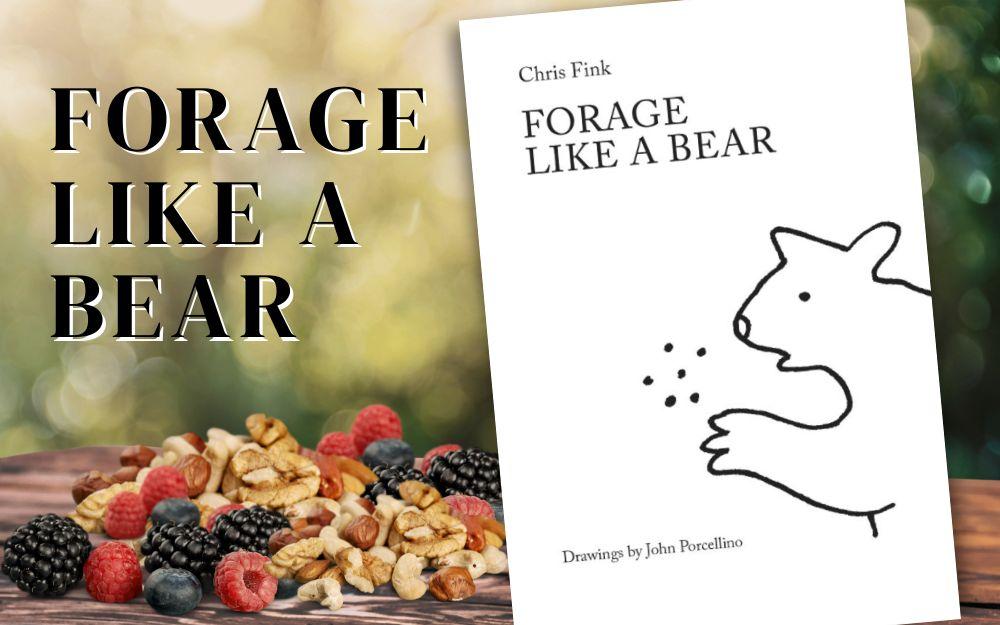 A wood picnic table outside with berries and nuts and "Forage Like a Bear" book cover