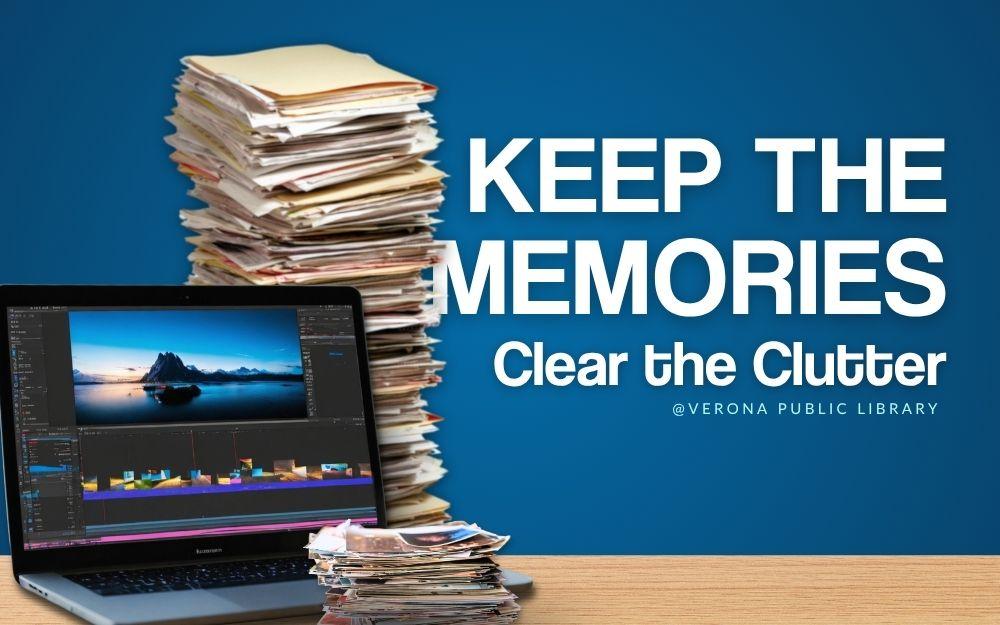 large stack of documents, a stack of photos, and a laptop with photo editing software open