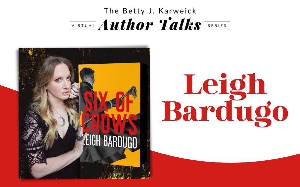 author Leigh Bardugo next to a copy of her book, "Six of Crows".