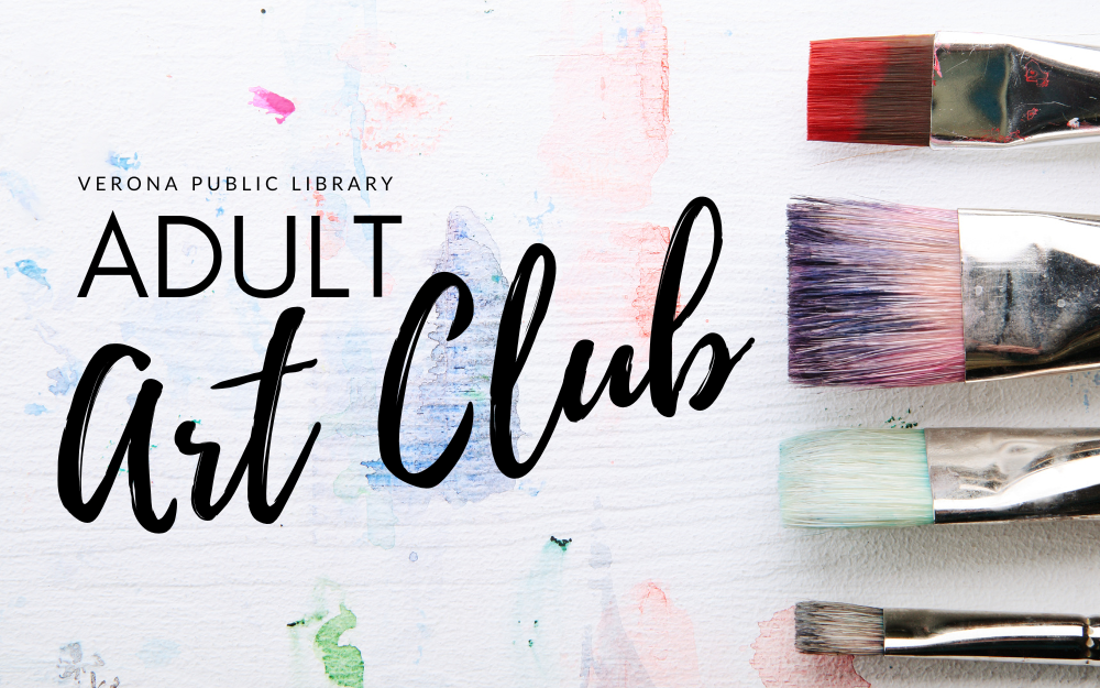 paintbrushes with watercolors on art paper